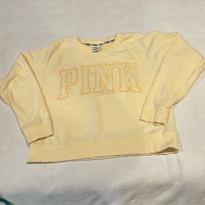 Victoria’s Secret yellow sweatshirt